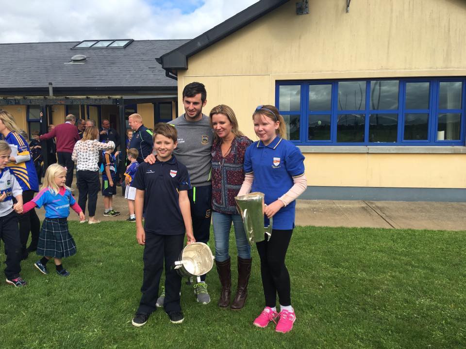 The Liam McCarthy and the Irish Press Cup visiting the local Primary Schools with Members of the Senior and Minor Victorious Teams